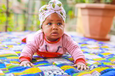 custom made playmat made with different patches of Kitenge