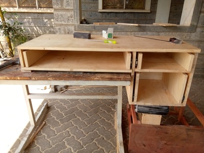 custom made  home office desk with a matching chair within custom made realization