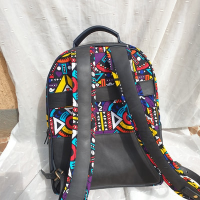 custom made fabric backpack with an extra compartment within custom made realization