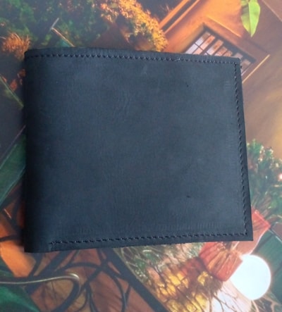two custom made unique leather wallets within custom made realization