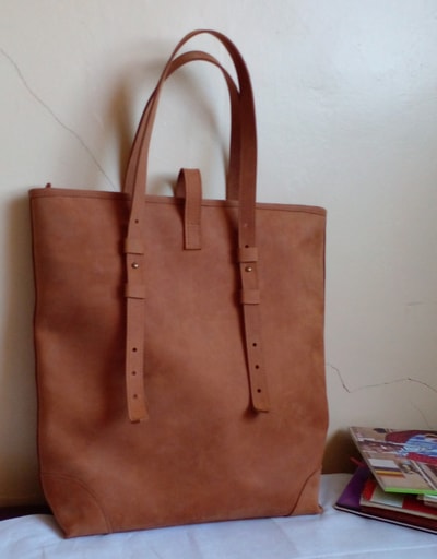 custom brown leather tote bag within custom made realization