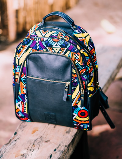 custom made fabric backpack with an extra compartment