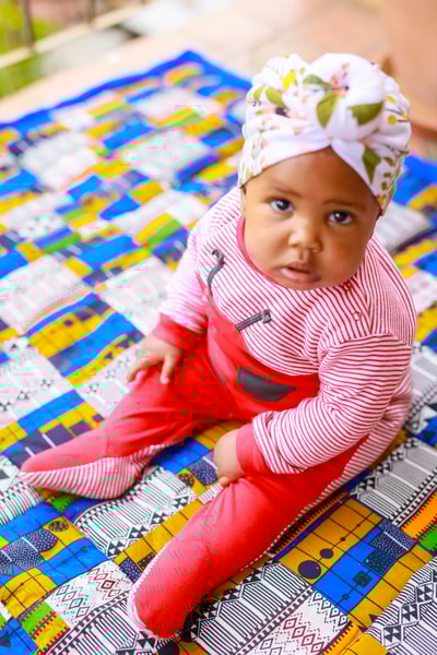 custom made playmat made with different patches of Kitenge