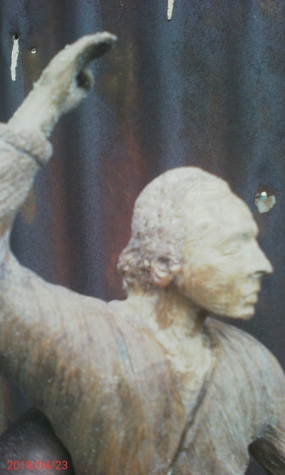 Sculpture modeled after the pictures below within custom made realization
