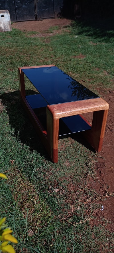 custom made Coffee Table with tinted glass within custom made realization