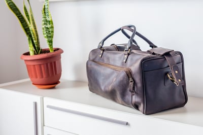 Custom made unisex duffle bag made from dark brown leather