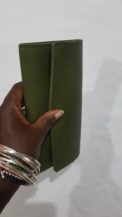custom made wallet with a swing top within custom made realization