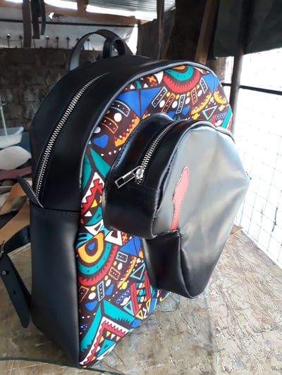 custom made backpack with the shape of Africa and Benin within custom made realization