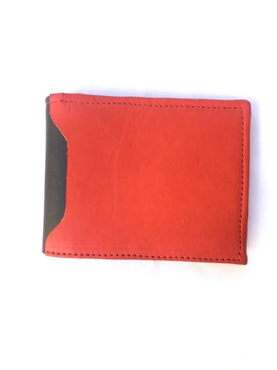 Custom made black and red wallet within custom made realization