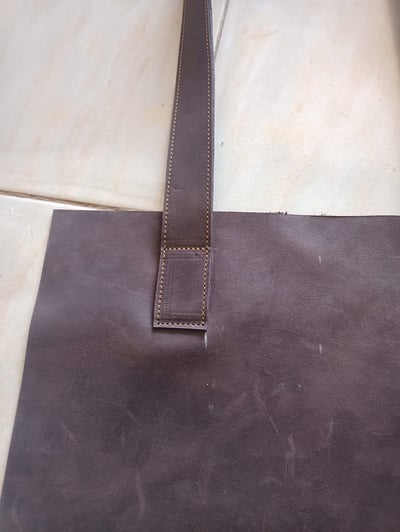 Custom made feminine leather tote bag within custom made realization