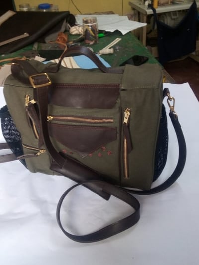 custom made shoulder bag: green fabric with dog paw print within custom made realization