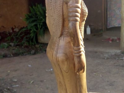 Buddha sculpture (female and African)