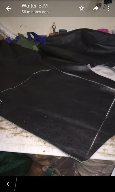 Custom made black leather handbag within custom made realization