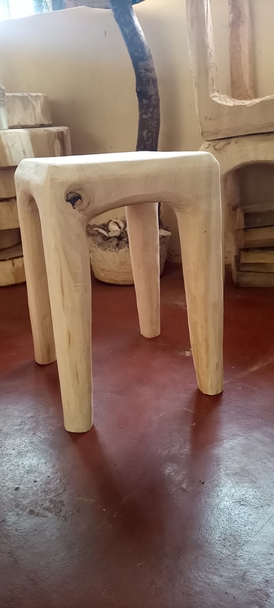 9 different custom made side tables within custom made realization