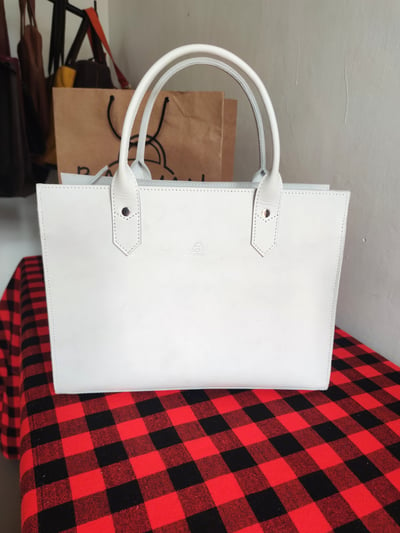 custom made white leather handbag within custom made realization