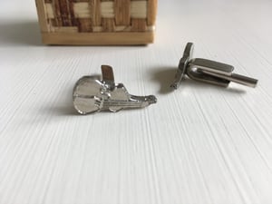 Two pairs of custom made cufflinks
