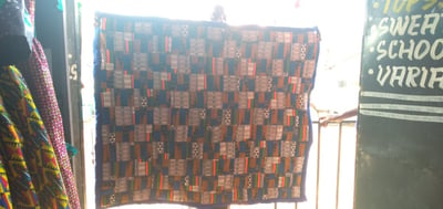 custom made playmat made with different patches of Kitenge within custom made realization