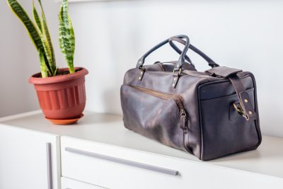 Custom made unisex duffle bag made from dark brown leather