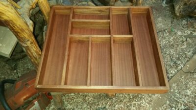 Cutlery tray of wood for a kitchen drawer within custom made realization