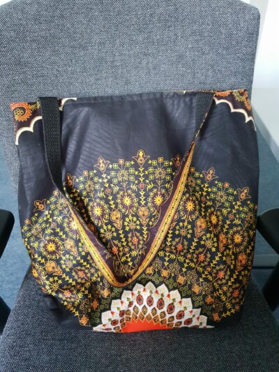 Custom made large handbag into which a 17 inch laptop fits. photos from customer