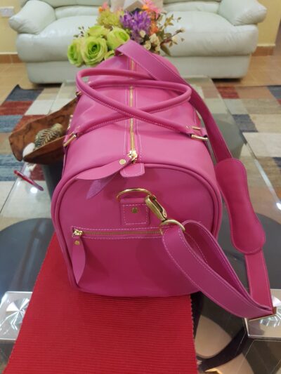 Custom made pink travel bag which can double up as a gym bag within custom made realization