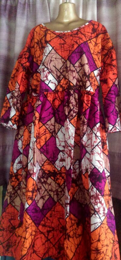 custom made long, loose dress in a bright waxprint fabric within custom made realization