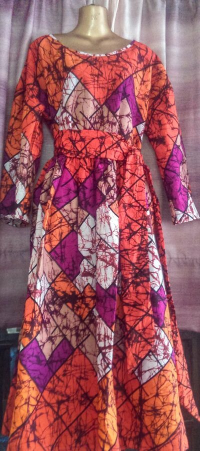 custom made long, loose dress in a bright waxprint fabric within custom made realization