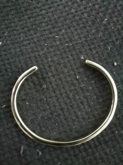 Custom made cuff bracelet made of brass within custom made realization