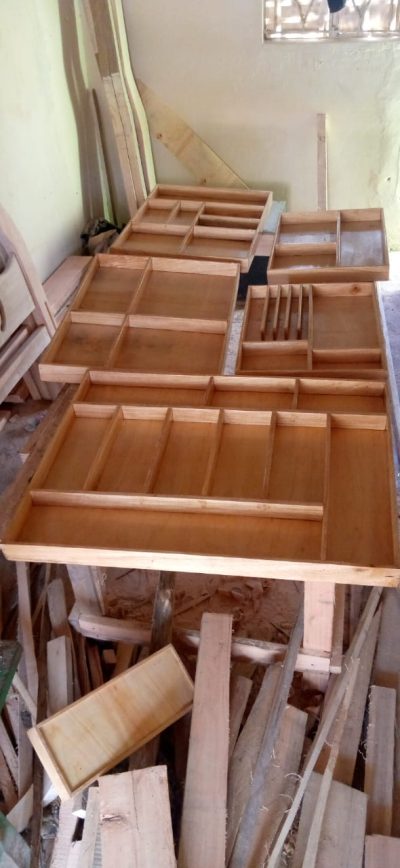 Several customized cutlery drawers within custom made realization