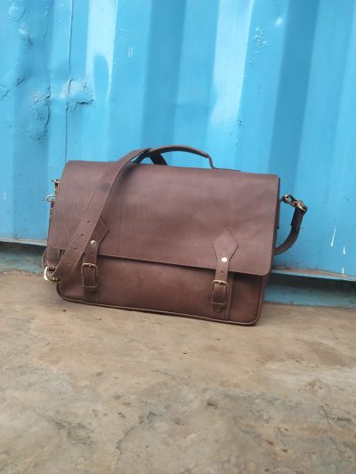 Custom made leather sling bag within custom made realization