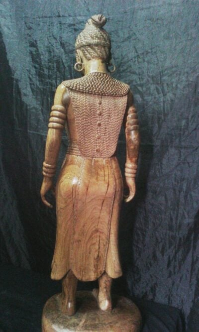 Buddha sculpture (female and African) within custom made realization