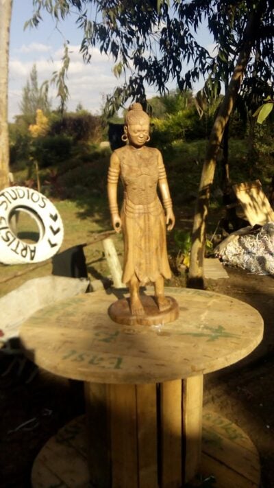 Buddha sculpture (female and African)