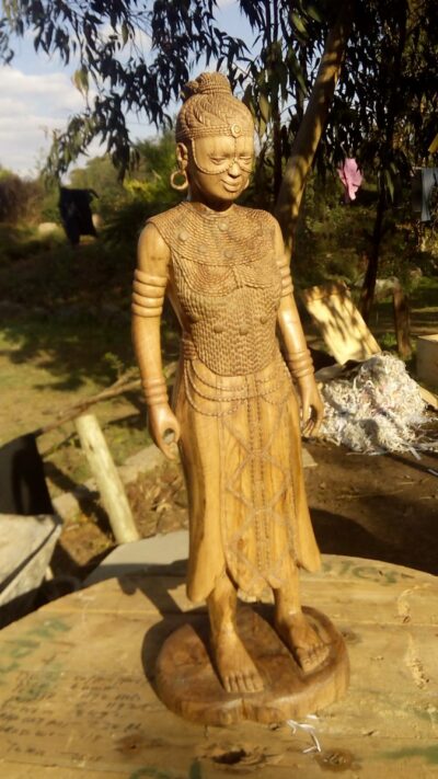 Buddha sculpture (female and African)