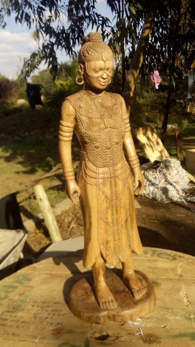 Buddha sculpture (female and African)
