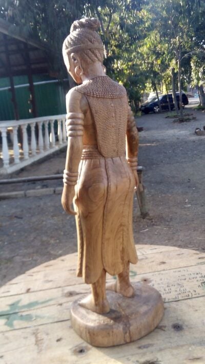 Buddha sculpture (female and African)