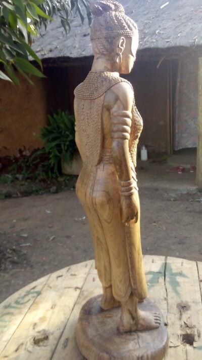 Buddha sculpture (female and African)
