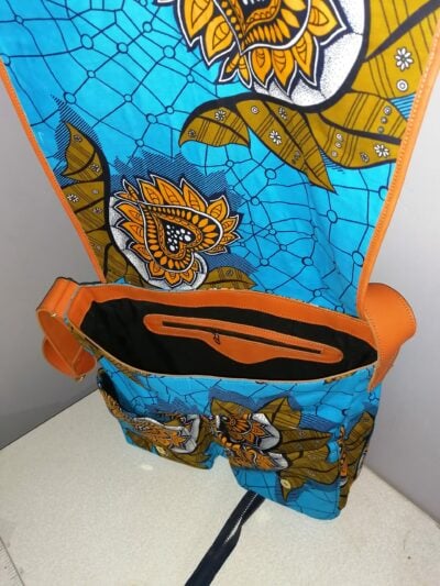 Custom made messenger bag about 25 cm high and 40 cm wide within custom made realization