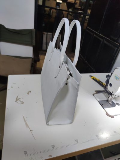 custom made white leather handbag within custom made realization