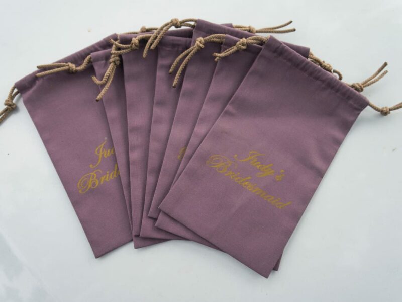 7 small drawstring bags made of cotton