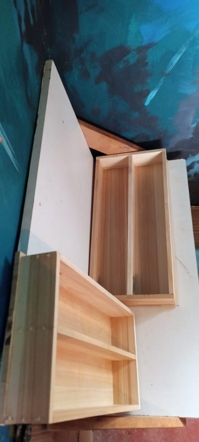 Two Custom-Made Drawer Inserts with Central Bar within custom made realization